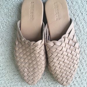 Women’s leather woven mules